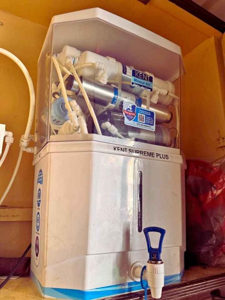 Side view of Kent Supreme Plus Ro Water Purifier with its tap visible